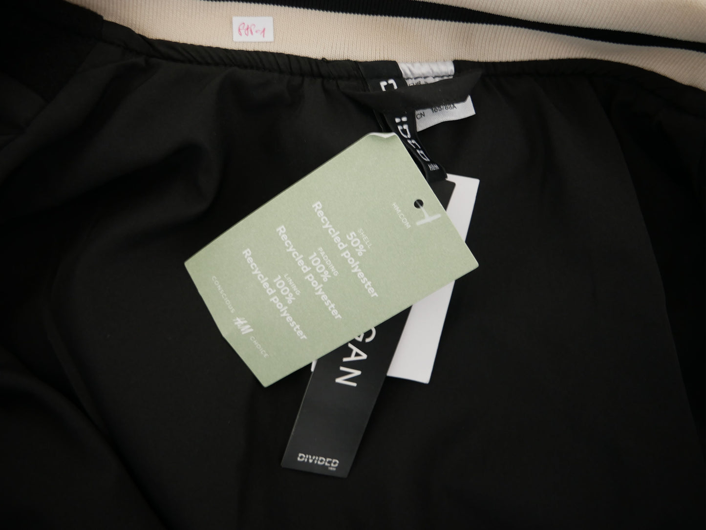 Geteilte Button-Down-Unijacke