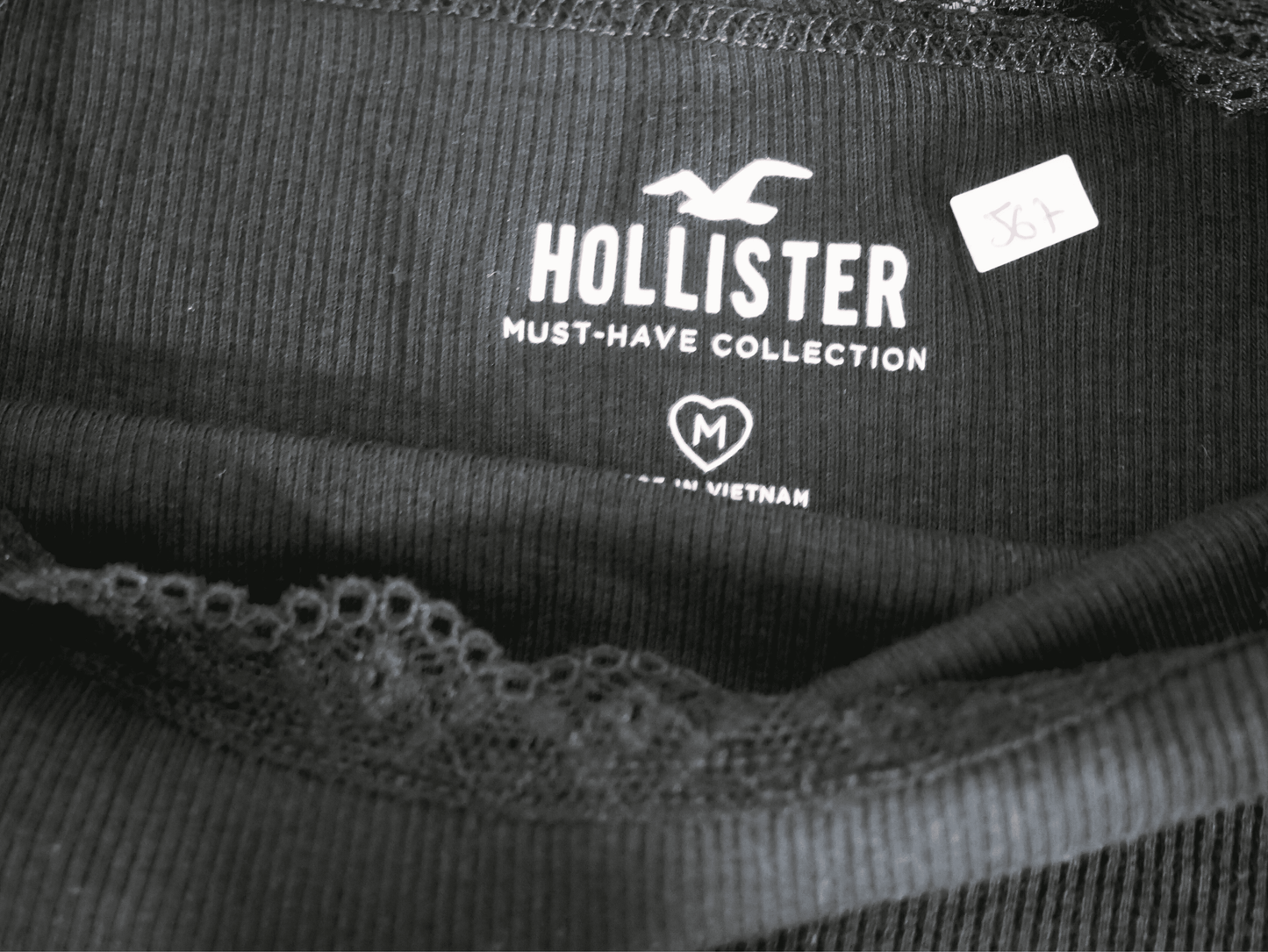 Top HOLLISTER noir couleur unie tendance pour femme