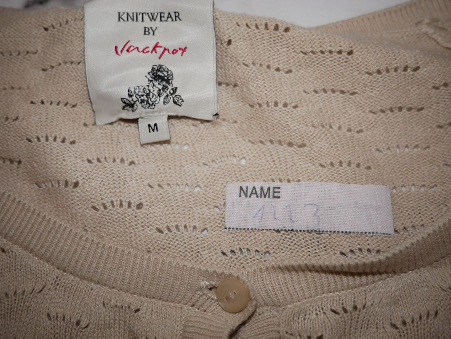 Pullover trois-quarts beige de seconde main