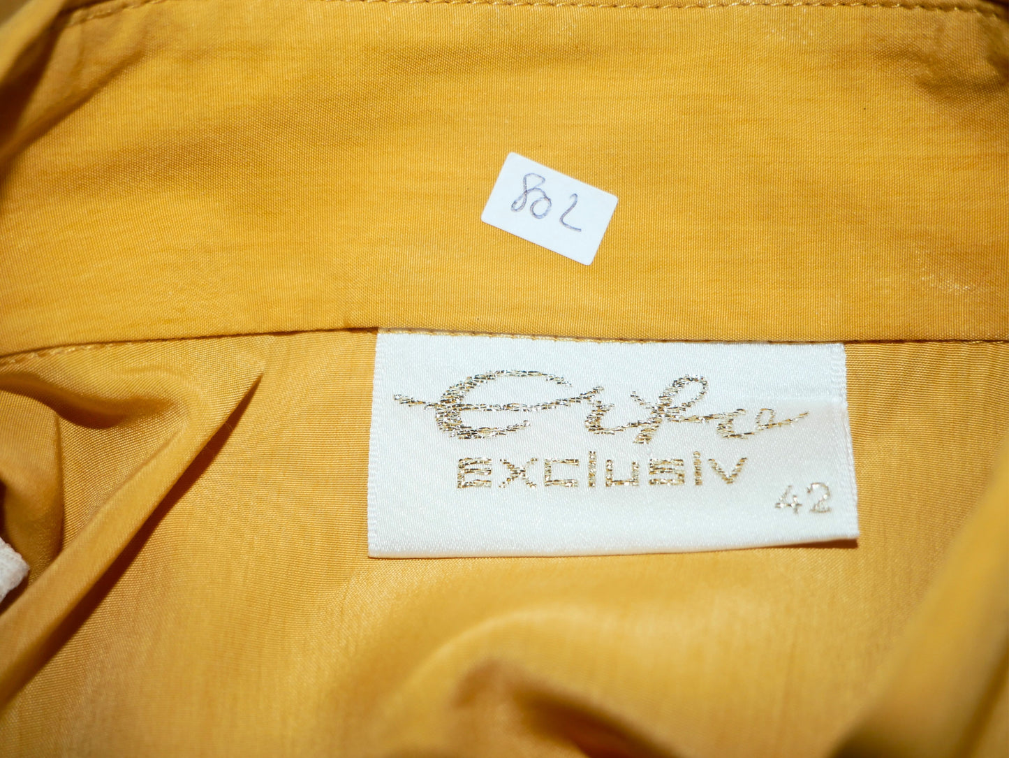 Gelbe Vintage-Langarmbluse