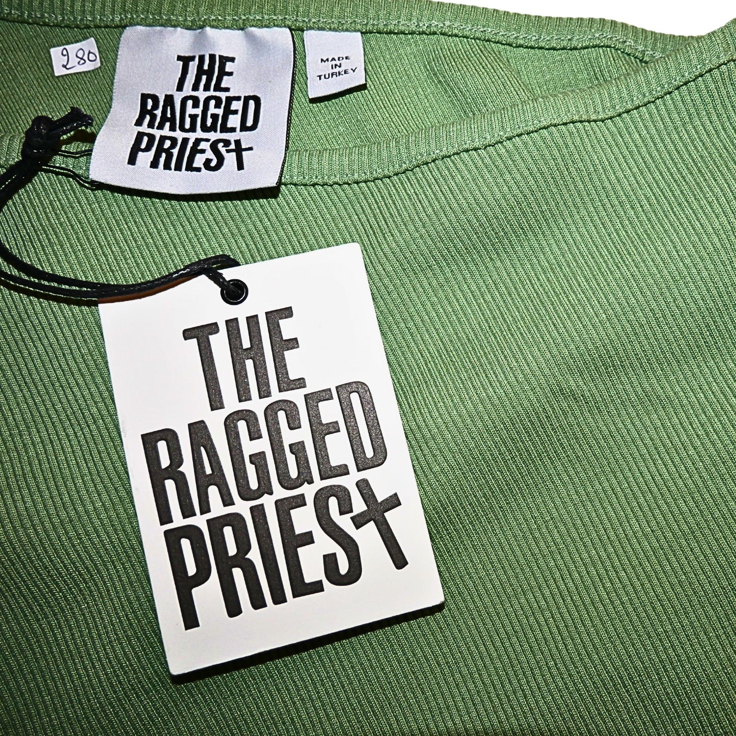 THE RAGGED PRIEST Top asymétrique